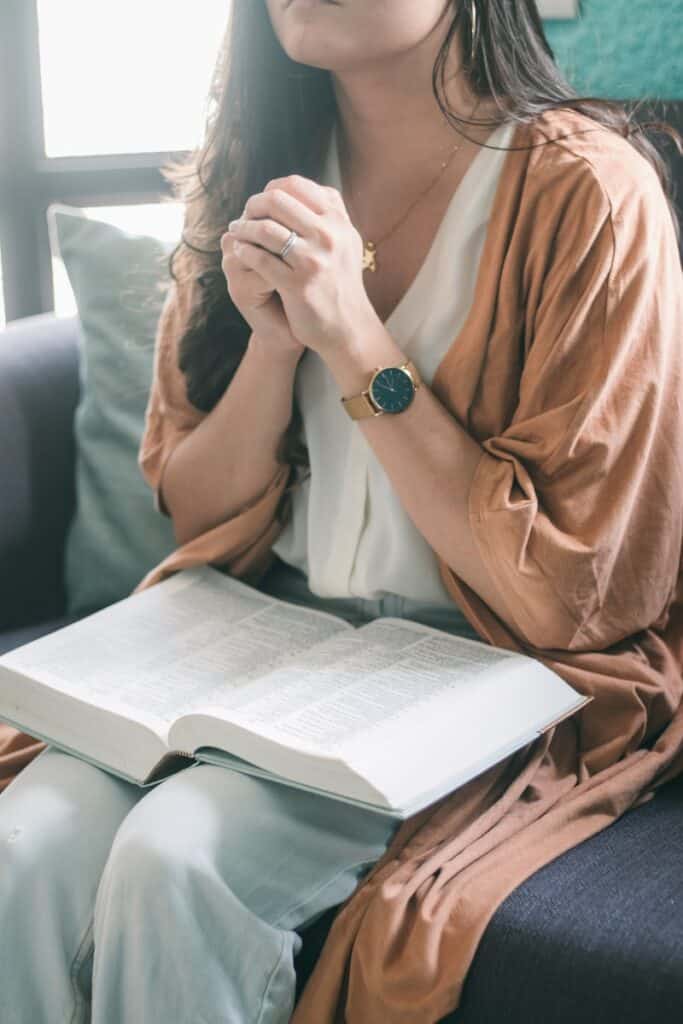 A praying Christian asking for divine guidance